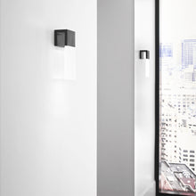 Load image into Gallery viewer, Kulma LED Wall Light in living room.
