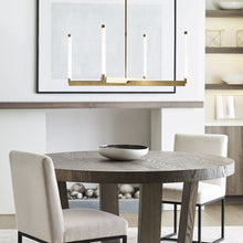 Load image into Gallery viewer, Phobos LED Chandelier in dining room.
