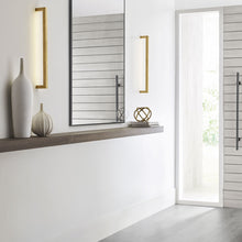 Load image into Gallery viewer, Stagger LED Wall Light in bathroom.
