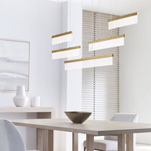 Load image into Gallery viewer, Sweep LED Linear Suspension Light in dining room.
