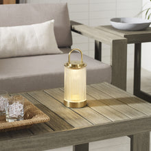 Load image into Gallery viewer, Tawa LED Table Lamp in Outside Area.
