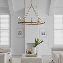 Load image into Gallery viewer, Darlana Rattan Wrapped Ringed LED  Chandelier in living room.
