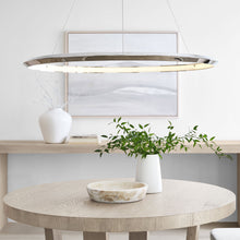 Load image into Gallery viewer, Encircle LED Chandelier in living room.
