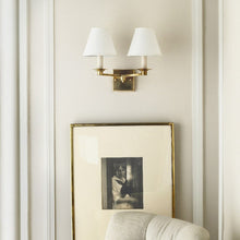 Load image into Gallery viewer, Evans Wall Light in living room.
