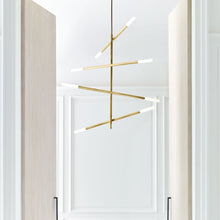 Load image into Gallery viewer, Rousseau Articulating LED Chandelier in living room.
