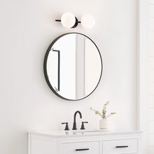 Load image into Gallery viewer, Lune LED Vanity Wall Light in bathroom.
