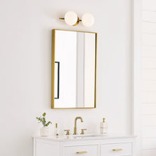 Load image into Gallery viewer, Lune LED Vanity Wall Light in bathroom.
