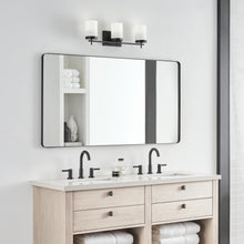 Load image into Gallery viewer, Zire Vanity Wall Light in bathroom.
