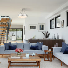 Load image into Gallery viewer, Anders LED Semi Flush Mount Ceiling Light in living room.
