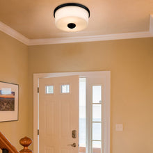 Load image into Gallery viewer, Arlington Flush Mount Ceiling Light in living room.
