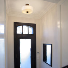 Load image into Gallery viewer, Arlington Semi Flush Mount Ceiling Light in living room.
