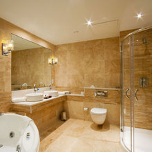 Load image into Gallery viewer, Aubrey Bath Wall Light in bathroom.
