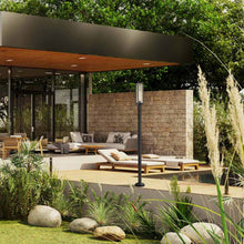 Load image into Gallery viewer, Aura Outdoor Lean Post Light in Outside Area.
