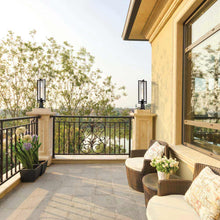 Load image into Gallery viewer, Aura Outdoor Pier Mounted Post Light in Outside Area.
