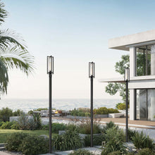 Load image into Gallery viewer, Aura Outdoor Post Light in Outside Area.
