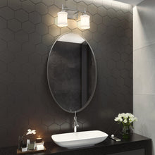 Load image into Gallery viewer, Cadoc Bath Vanity Light in bathroom.
