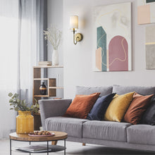 Load image into Gallery viewer, Ella Wall Light in living room.
