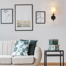 Load image into Gallery viewer, Ella Wall Light in living room.
