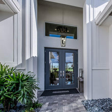 Load image into Gallery viewer, Gannon Outdoor Pendant Light in Outside Area.
