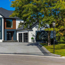Load image into Gallery viewer, Gannon Outdoor Sleek Post Light in Outside Area.

