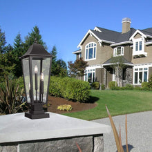 Load image into Gallery viewer, Gannon Outdoor Sloped Top Post Light in Outside Area.

