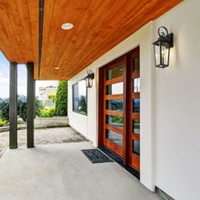 Load image into Gallery viewer, Gannon Outdoor Wall Light in Outside Area.
