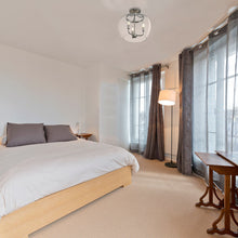 Load image into Gallery viewer, Joliet Semi Flush Mount Ceiling Light in bedroom.
