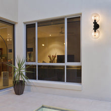 Load image into Gallery viewer, Laurent Outdoor Wall Light in Outside Area.
