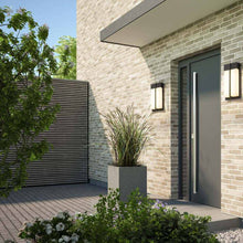 Load image into Gallery viewer, Nyx Outdoor LED Wall Light in Outside Area.
