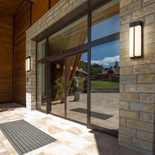 Load image into Gallery viewer, Nyx Outdoor LED Wall Light in Outside Area.
