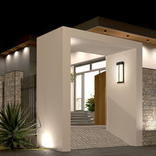 Load image into Gallery viewer, Nyx Outdoor LED Wall Light in Outside Area.
