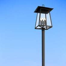 Load image into Gallery viewer, Rainer Outdoor Clear Glass Post Light in Outside Area.

