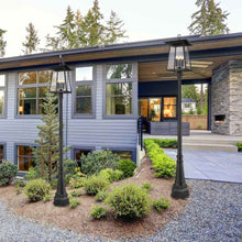 Load image into Gallery viewer, Rainer Outdoor Ornate Post Light in Outside Area.
