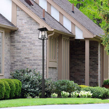 Load image into Gallery viewer, Rainer Outdoor Round Post Light in Outside Area.
