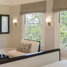 Load image into Gallery viewer, Saxon Wall Light in living room.
