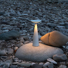 Load image into Gallery viewer, Dama LED Table Lamp in Outside Area.
