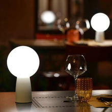 Load image into Gallery viewer, Olimpia LED Table Lamp in restaurant.

