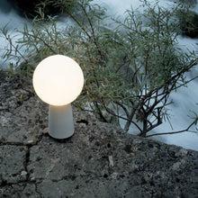 Load image into Gallery viewer, Olimpia LED Table Lamp in Outside Area.
