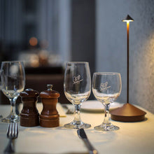 Load image into Gallery viewer, Pina Pro LED Table Lamp in restaurant.
