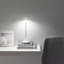 Load image into Gallery viewer, Pina Pro LED Table Lamp in living room.
