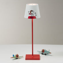 Load image into Gallery viewer, Poldina X Peanuts LED Table Lamp in living room.
