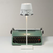 Load image into Gallery viewer, Poldina X Peanuts LED Table Lamp in living room.
