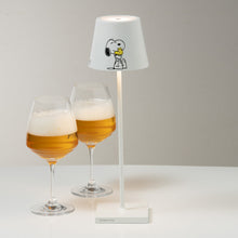 Load image into Gallery viewer, Poldina X Peanuts LED Table Lamp in living room.
