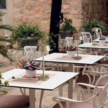 Load image into Gallery viewer, Sister LED Portable Table Lamp in Outside Area.
