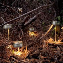 Load image into Gallery viewer, Sister Light Mini LED Table Lamp in Outside Area.
