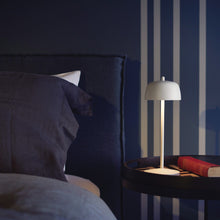 Load image into Gallery viewer, Theta Pro LED Table Lamp in bedroom.

