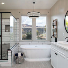 Load image into Gallery viewer, Terzo Pendant Light in bathroom.
