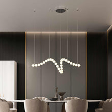 Load image into Gallery viewer, Akoya LED Linear Pendant Light in dining room.

