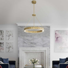 Load image into Gallery viewer, Kensington LED Pendant Light in living room.
