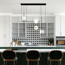 Load image into Gallery viewer, Tagliato LED Linear Chandelier in dining room.
